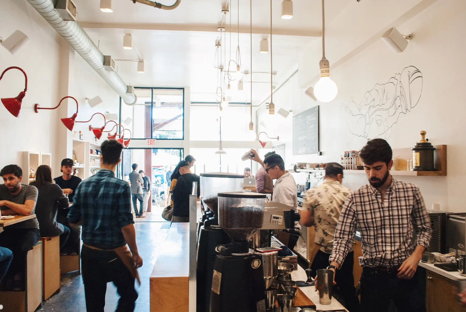 Customers and baristas inside the original Go Get Em Tiger on Larchmont Boulevard