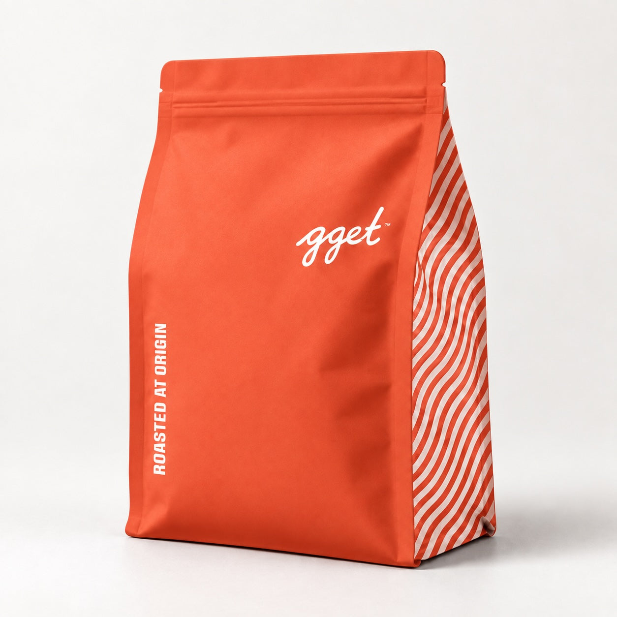 Red GGET bag labeled Roasted at Origin